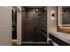 Modern bathroom with glass shower, double vanity, and elegant fixtures at 2360 Ocean Shore Blvd # 8, Ormond Beach, FL 32176