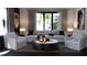 Sophisticated living room featuring stylish decor, designer furniture, and ample natural light at 2360 Ocean Shore Blvd # 8, Ormond Beach, FL 32176
