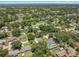 Overhead view of the neighborhood showcasing mature trees and lush landscaping surrounding the homes at 2531 Needle Palm Dr, Edgewater, FL 32141