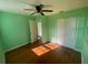 Bright bedroom with hardwood floors and closet at 264 Sherwood Ln, Daytona Beach, FL 32117