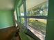 Exterior view from interior through a window at 264 Sherwood Ln, Daytona Beach, FL 32117