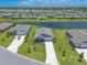 Aerial shot of the home and neighborhood with a pond behind the home at 2836 Monaghan Dr, Ormond Beach, FL 32174