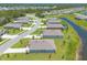 Expansive aerial view of a single-Gathering home in a well-planned community, showcasing the neighborhood and surrounding landscape at 2836 Monaghan Dr, Ormond Beach, FL 32174