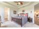 Neutral bedroom with views to en-suite bathroom and hallway, bright and airy at 2836 Monaghan Dr, Ormond Beach, FL 32174