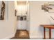 A coffee bar is nestled between the kitchen and entry hall at 2836 Monaghan Dr, Ormond Beach, FL 32174
