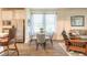 Breakfast nook with a dining table and access to the living room and kitchen at 2836 Monaghan Dr, Ormond Beach, FL 32174