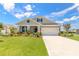 Charming single-Gathering home with well-manicured lawn and inviting curb appeal in a bright and sunny neighborhood at 2836 Monaghan Dr, Ormond Beach, FL 32174