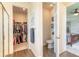 Hallway with views to bedroom, water closet, and walk-in closet at 2836 Monaghan Dr, Ormond Beach, FL 32174