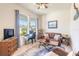 Cozy home office with ample natural light, comfortable seating, and functional workspace at 2836 Monaghan Dr, Ormond Beach, FL 32174