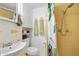 Classic bathroom featuring a shower with colorful fixtures and decor at 918 N Wild Olive Ave, Daytona Beach, FL 32118