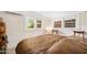 Cozy bedroom with natural light and a large bed is the perfect retreat at 918 N Wild Olive Ave, Daytona Beach, FL 32118