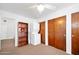 Bright bedroom featuring laundry, closet, and doorway into another room at 918 N Wild Olive Ave, Daytona Beach, FL 32118