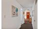 Hallway leads into a living room with hardwood doors at 918 N Wild Olive Ave, Daytona Beach, FL 32118
