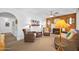 Comfortable living room with woven furniture and a decorative fireplace at 918 N Wild Olive Ave, Daytona Beach, FL 32118