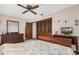 Bedroom with ceiling fan, a window, and built-in storage in a well-lit space at 1108 Northside Dr, Ormond Beach, FL 32174