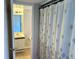 Cozy bathroom with a shower curtain and neutral vanity at 1162 Carmel Cir # 100, Casselberry, FL 32707