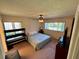 Bright bedroom offers a comfortable sleeping area, a study desk, and plenty of natural light at 1162 Carmel Cir # 100, Casselberry, FL 32707