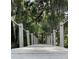 Scenic wooden bridge with rope railings leading to a picturesque view at 1162 Carmel Cir # 100, Casselberry, FL 32707