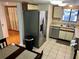 Bright kitchen features stainless steel appliances and an adjacent dining area at 1162 Carmel Cir # 100, Casselberry, FL 32707