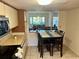 Cozy kitchen with view to dining and living room, great for entertaining guests at 1162 Carmel Cir # 100, Casselberry, FL 32707