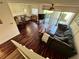 Open-concept living room showcases a large sectional sofa and sliding glass doors to the outdoor area at 1162 Carmel Cir # 100, Casselberry, FL 32707