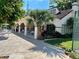 Inviting community pool area with seating, shade, and well-maintained landscaping at 1162 Carmel Cir # 100, Casselberry, FL 32707