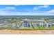 Stunning aerial view of oceanfront condo with pool, beach access, and city views at 1239 Ocean Shore Blvd # 3C3, Ormond Beach, FL 32176