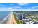 Scenic aerial shot of a beachfront condo offering ocean views and pool access at 1239 Ocean Shore Blvd # 3C3, Ormond Beach, FL 32176