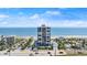 An aerial view of an oceanfront condo with beach access and parking at 1239 Ocean Shore Blvd # 3C3, Ormond Beach, FL 32176