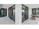 Corner view of the wide balcony area with sliding doors to access the living space at 1239 Ocean Shore Blvd # 3C3, Ormond Beach, FL 32176