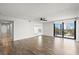 Spacious living room with wood flooring and outdoor views at 1239 Ocean Shore Blvd # 3C3, Ormond Beach, FL 32176