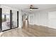 Spacious living room with access to a balcony at 1239 Ocean Shore Blvd # 3C3, Ormond Beach, FL 32176