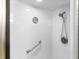 Modern walk-in shower featuring sleek, accessible design and hardware at 1239 Ocean Shore Blvd # 3C3, Ormond Beach, FL 32176