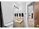 Bathroom showcasing neutral colors, vanity and toilet at 133 Blue Heron Dr # D, Daytona Beach, FL 32119