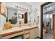 Bathroom featuring lots of counter space, decorative hardware and a separate toilet and shower area at 133 Blue Heron Dr # D, Daytona Beach, FL 32119
