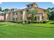 Charming two-story home featuring manicured landscaping and inviting curb appeal at 133 Blue Heron Dr # D, Daytona Beach, FL 32119