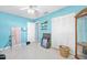 Room featuring closet, adjacent door, small shelves and a basket at 1505 Valencia Ave, Daytona Beach, FL 32117