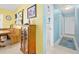 Hallway view showcases access to dining area and white closet doors to the side at 1505 Valencia Ave, Daytona Beach, FL 32117