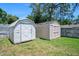 Two storage sheds in the backyard at 1505 Valencia Ave, Daytona Beach, FL 32117