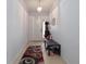 Bright entryway featuring tile flooring, neutral colored walls and a decorative rug at 209 Falcon Ave, Edgewater, FL 32141