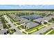 Beautiful aerial view of the community and neighborhood lake at 3048 Borassus Dr, New Smyrna Beach, FL 32168