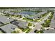 Aerial shot showcasing neighborhood and the surrounding lake at 3048 Borassus Dr, New Smyrna Beach, FL 32168