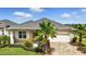 Beautiful single-Gathering home with well manicured lawn at 3048 Borassus Dr, New Smyrna Beach, FL 32168
