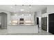 A stylish kitchen with a large island, modern stainless-steel appliances, and a bright, open layout at 3048 Borassus Dr, New Smyrna Beach, FL 32168
