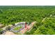 Aerial shot of apartments surrounded by lush greenery, showcasing a serene and private community setting at 3522 Forest Branch Dr # D, Port Orange, FL 32129