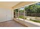 Enclosed screened patio with access to the outdoors at 3522 Forest Branch Dr # D, Port Orange, FL 32129