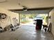 Spacious two car garage with ample storage, equipped with a garage door opener and room for vehicles at 465 Dahoon Holly Dr, Daytona Beach, FL 32117