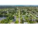 Scenic aerial view of the neighborhood showcasing tree-lined streets and residential properties near the bay at 950 Pineapple Rd, South Daytona, FL 32119