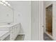 Bright, traditional bathroom features a shower, vanity, and toilet at 950 Pineapple Rd, South Daytona, FL 32119