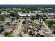 Aerial view showcasing the property, neighborhood, nearby amenities, and large, refreshing swimming pool at 105 Bonita Pl, Ormond Beach, FL 32174